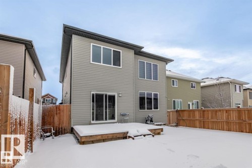 The property features a two-story exterior with light gray siding and a dark gray roof - 3608 46 Avenue, Beaumont, AB - Outdoor With Exterior