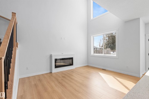 5133 53 Avenue, Calmar, AB - Indoor Photo Showing Living Room With Fireplace