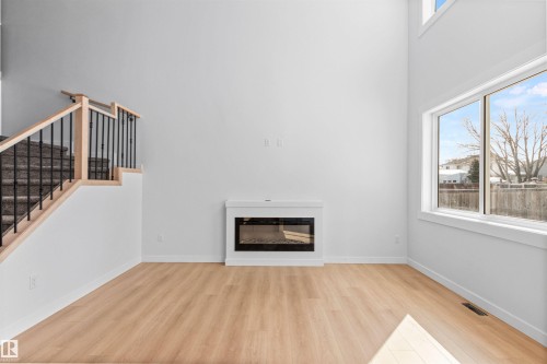 5133 53 Avenue, Calmar, AB - Indoor Photo Showing Other Room With Fireplace