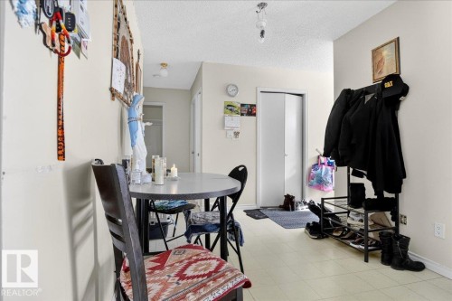 This area features light-colored walls, a ceiling with a textured finish, and a light-toned floor - 13304 130 Avenue, Edmonton, AB - Indoor
