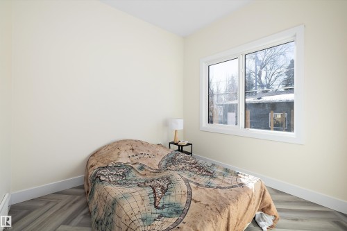Main floor bedroom. Bedroom 2 - 8321 81Ave, Edmonton, AB - Indoor Photo Showing Bedroom
