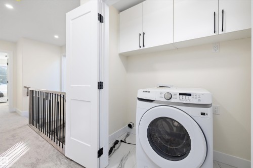 Laundry machines not yet put into place - 8321 81Ave, Edmonton, AB - Indoor Photo Showing Laundry Room