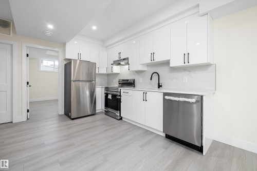 Legal suite kitchen - 8321 81Ave, Edmonton, AB - Indoor Photo Showing Kitchen