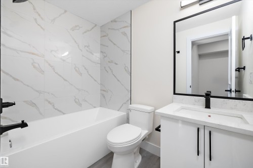 Legal suite full bathroom - 8321 81Ave, Edmonton, AB - Indoor Photo Showing Bathroom