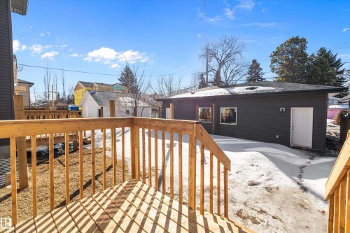 Nice big deck in the rear, landscaping and fencing included! - 8321 81Ave, Edmonton, AB - Outdoor With Deck Patio Veranda With Exterior