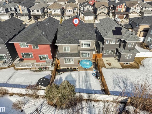 The property features a fenced backyard with a patio area and a deck - 1531 151 Avenue, Edmonton, AB - Outdoor