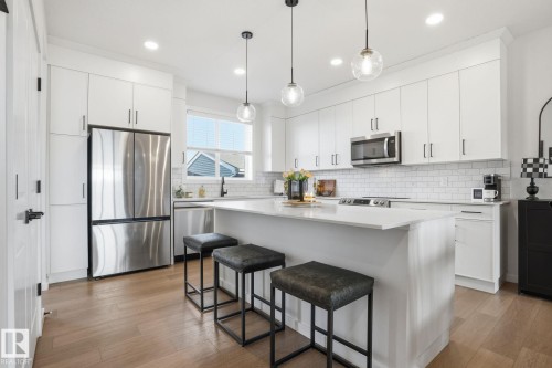 7012 54 Avenue, Beaumont, AB - Indoor Photo Showing Kitchen With Upgraded Kitchen