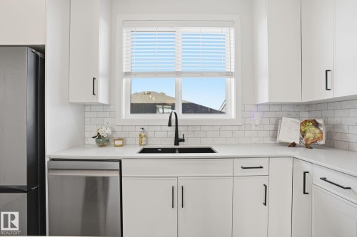 7012 54 Avenue, Beaumont, AB - Indoor Photo Showing Kitchen With Double Sink With Upgraded Kitchen