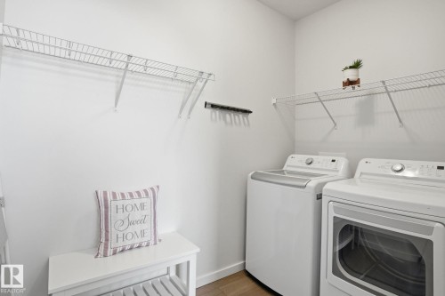 7012 54 Avenue, Beaumont, AB - Indoor Photo Showing Laundry Room