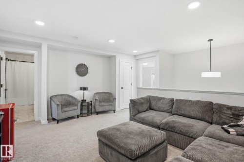7012 54 Avenue, Beaumont, AB - Indoor Photo Showing Living Room