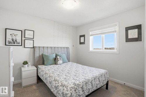 7012 54 Avenue, Beaumont, AB - Indoor Photo Showing Bedroom