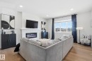 7012 54 Avenue, Beaumont, AB  - Indoor Photo Showing Living Room With Fireplace 