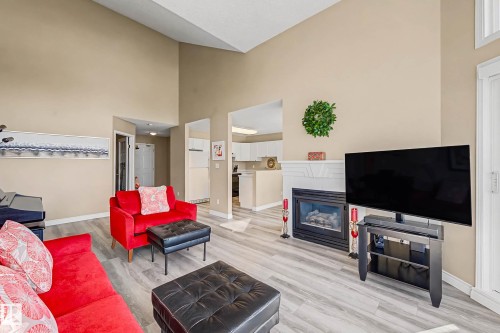 411 65 Gervais Road, St. Albert, AB - Indoor Photo Showing Living Room With Fireplace