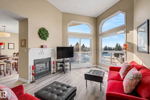 411 65 Gervais Road, St. Albert, AB - Indoor Photo Showing Living Room With Fireplace