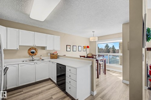 411 65 Gervais Road, St. Albert, AB - Indoor Photo Showing Kitchen With Double Sink