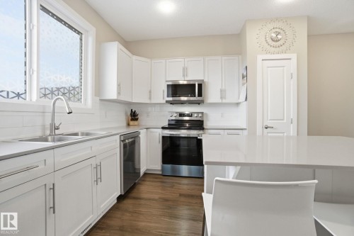 1170 Rosenthal Boulevard, Edmonton, AB - Indoor Photo Showing Kitchen With Double Sink