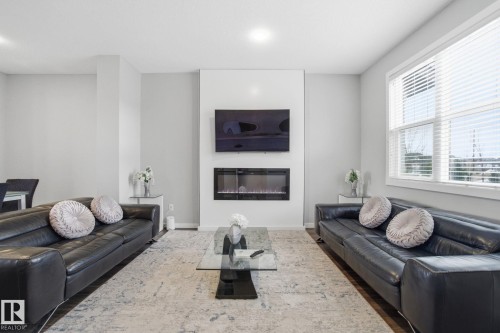 1170 Rosenthal Boulevard, Edmonton, AB - Indoor Photo Showing Living Room With Fireplace