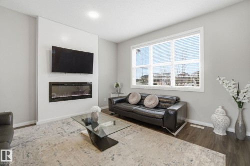 1170 Rosenthal Boulevard, Edmonton, AB - Indoor Photo Showing Living Room With Fireplace