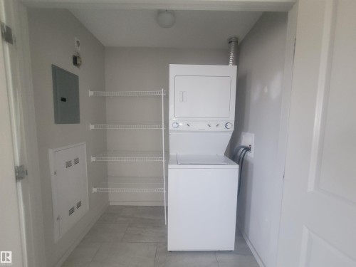 435 5515 7 Avenue, Edmonton, AB - Indoor Photo Showing Laundry Room