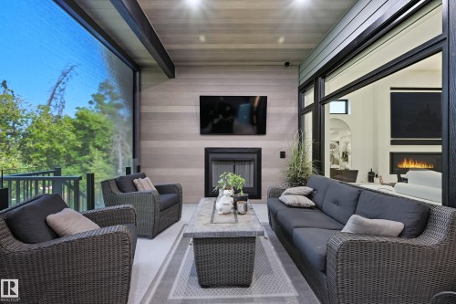 14312 92A Avenue, Edmonton, AB - Indoor Photo Showing Living Room With Fireplace