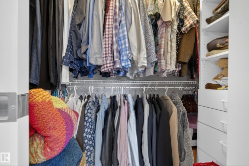 The property features a closet with white wire shelving and hanging rods - 1119 Rutherford Close, Edmonton, AB - Indoor With Storage