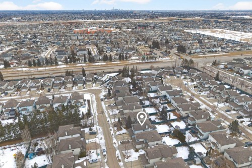 Aerial view showcasing the residential neighborhood with a variety of homes, streets, and scattered trees - 1119 Rutherford Close, Edmonton, AB - Outdoor With View