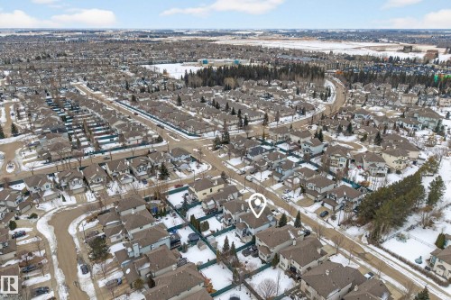 Aerial view showcasing the residential neighbourhood with numerous houses and streets - 1119 Rutherford Close, Edmonton, AB - Outdoor With View