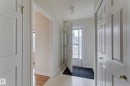 Inviting entryway featuring light-colored flooring, a white paneled door, and a clear glass front door - 5 308 Jackson Road, Edmonton, AB  - Indoor Photo Showing Other Room 