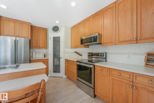 1033 Carter Crest Road, Edmonton, AB - Indoor Photo Showing Kitchen With Stainless Steel Kitchen