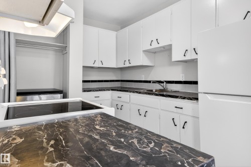 Edmonton, AB - Indoor Photo Showing Kitchen With Double Sink
