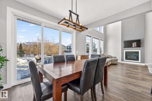 8810 24 Avenue, Edmonton, AB - Indoor Photo Showing Dining Room With Fireplace