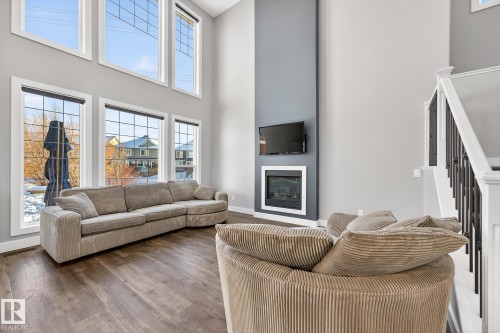 8810 24 Avenue, Edmonton, AB - Indoor Photo Showing Living Room With Fireplace
