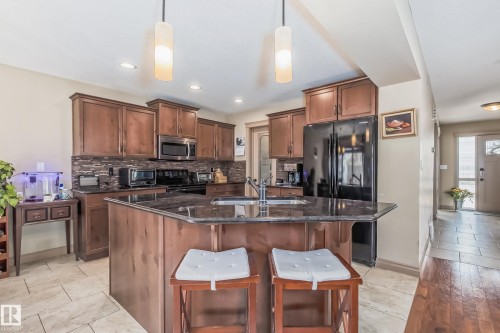 1204 Colonel Stone Avenue, Edmonton, AB - Indoor Photo Showing Kitchen With Stainless Steel Kitchen With Double Sink