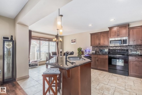 1204 Colonel Stone Avenue, Edmonton, AB - Indoor Photo Showing Kitchen With Double Sink