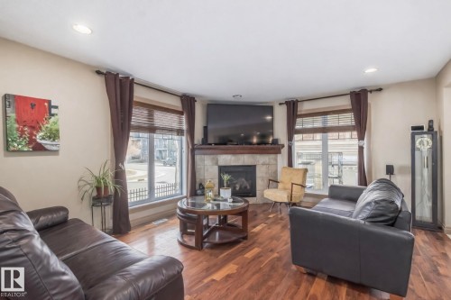 1204 Colonel Stone Avenue, Edmonton, AB - Indoor Photo Showing Living Room With Fireplace