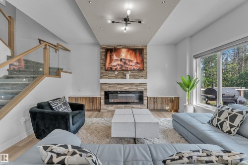 16115 34 Avenue, Edmonton, AB - Indoor Photo Showing Living Room With Fireplace