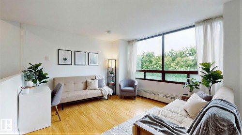 417 10160 114 Street, Edmonton, AB - Indoor Photo Showing Living Room