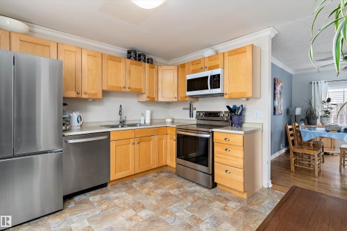 3536 12A Ave, Edmonton, AB - Indoor Photo Showing Kitchen With Double Sink
