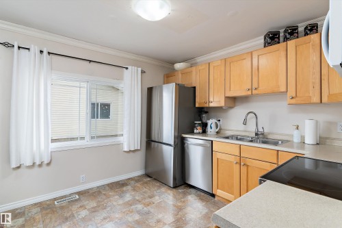 3536 12A Ave, Edmonton, AB - Indoor Photo Showing Kitchen With Double Sink
