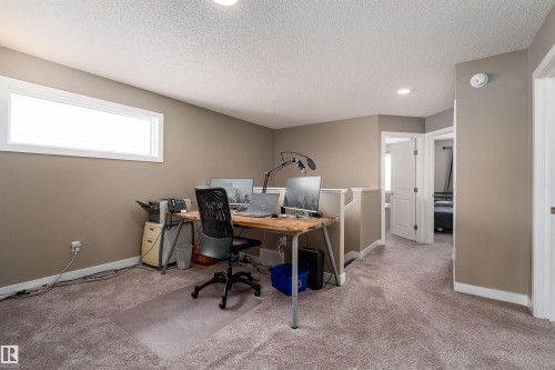 Office featuring light carpet, a textured ceiling, and recessed lighting - 1964 Kroetsch Crescent, Edmonton, AB - Indoor Photo Showing Office
