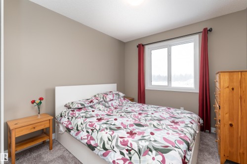 View of carpeted bedroom - 1964 Kroetsch Crescent, Edmonton, AB - Indoor Photo Showing Bedroom