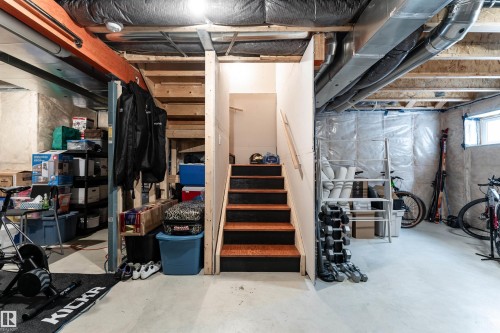 Basement with stairs - 1964 Kroetsch Crescent, Edmonton, AB - Indoor Photo Showing Basement