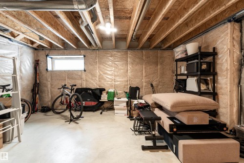 Workout room featuring finished concrete floors - 1964 Kroetsch Crescent, Edmonton, AB - Indoor Photo Showing Basement