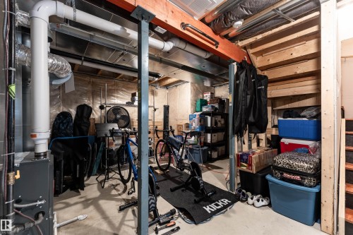 Workout room with concrete floors and heating unit - 1964 Kroetsch Crescent, Edmonton, AB - Indoor Photo Showing Basement