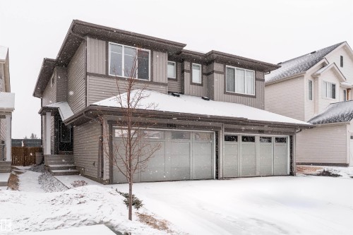 View of front of property featuring a garage - 1964 Kroetsch Crescent, Edmonton, AB - Outdoor