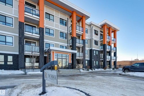 101 17 Columbia Avenue, Devon, AB - Outdoor With Facade