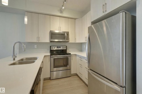 101 17 Columbia Avenue, Devon, AB - Indoor Photo Showing Kitchen With Stainless Steel Kitchen With Double Sink With Upgraded Kitchen