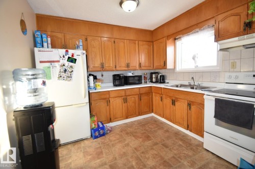 4903 49 Avenue, Vilna, AB - Indoor Photo Showing Kitchen With Double Sink