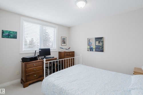 11660 15 Avenue Nw, Edmonton, AB - Indoor Photo Showing Bedroom