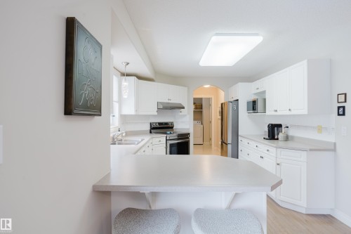 11660 15 Avenue Nw, Edmonton, AB - Indoor Photo Showing Kitchen With Double Sink